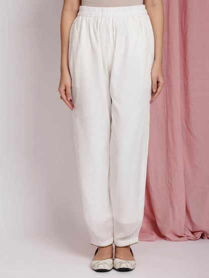 IVORY PANTS WITH PIPPING DETAIL
