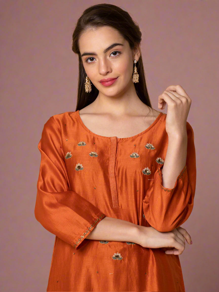 ORANGE SEQUIN EMBROIDERED CHANDERI KURTA WITH OLIVE GREEN PANTS
